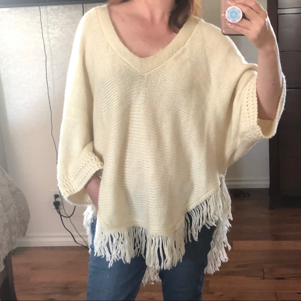 Uniq cream color poncho sweater sz M